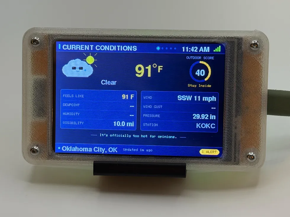 Storm Sentinel current-conditions screen: 91°F clear, Outdoor Score 40 (“Stay Inside”), in the semi-transparent enclosure