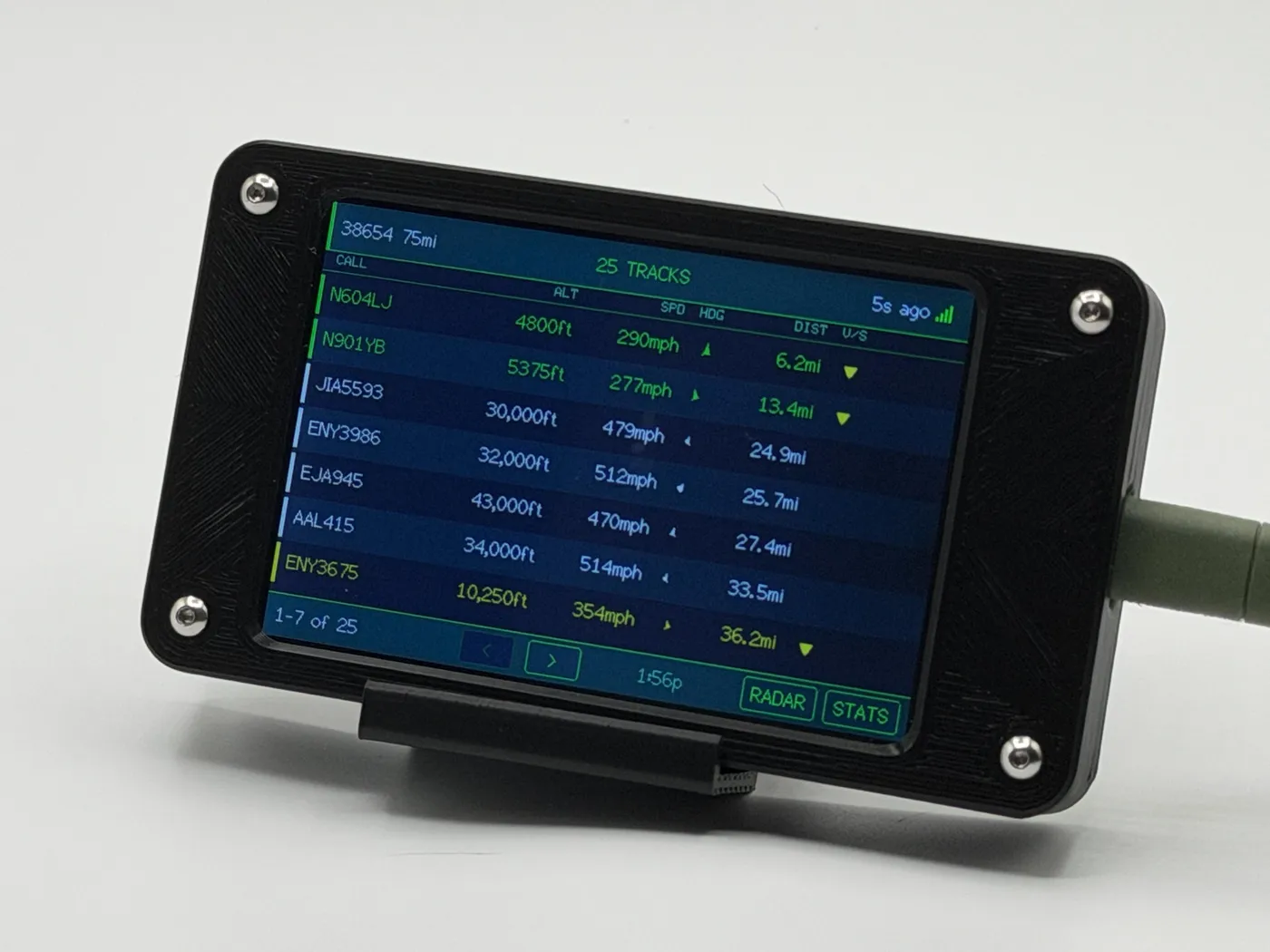 Squawk Box flight tracker on a desk