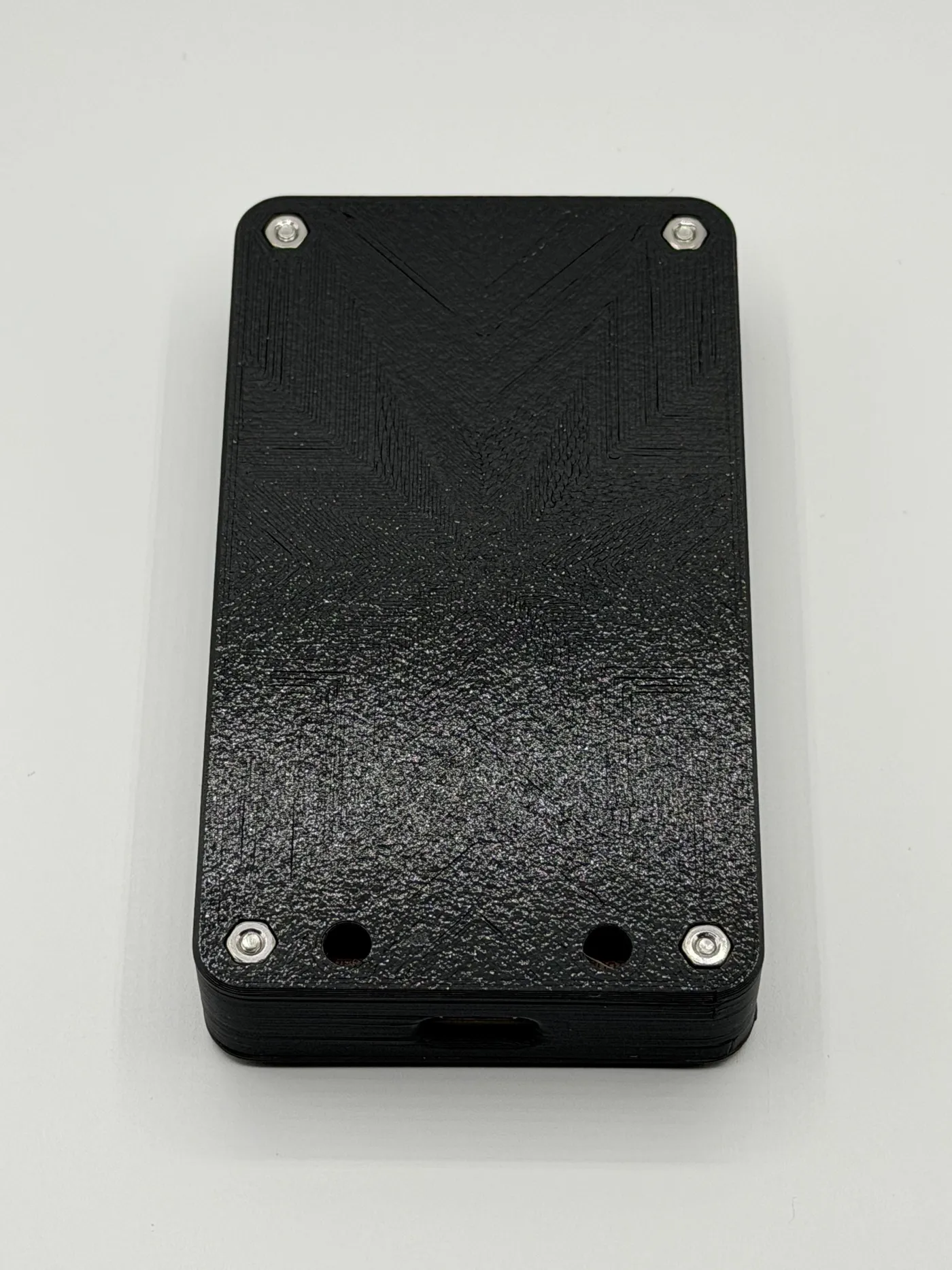 Back of the textured black 3D-printed enclosure