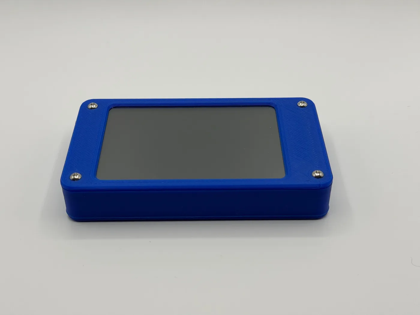Front view of the blue 3D-printed enclosure