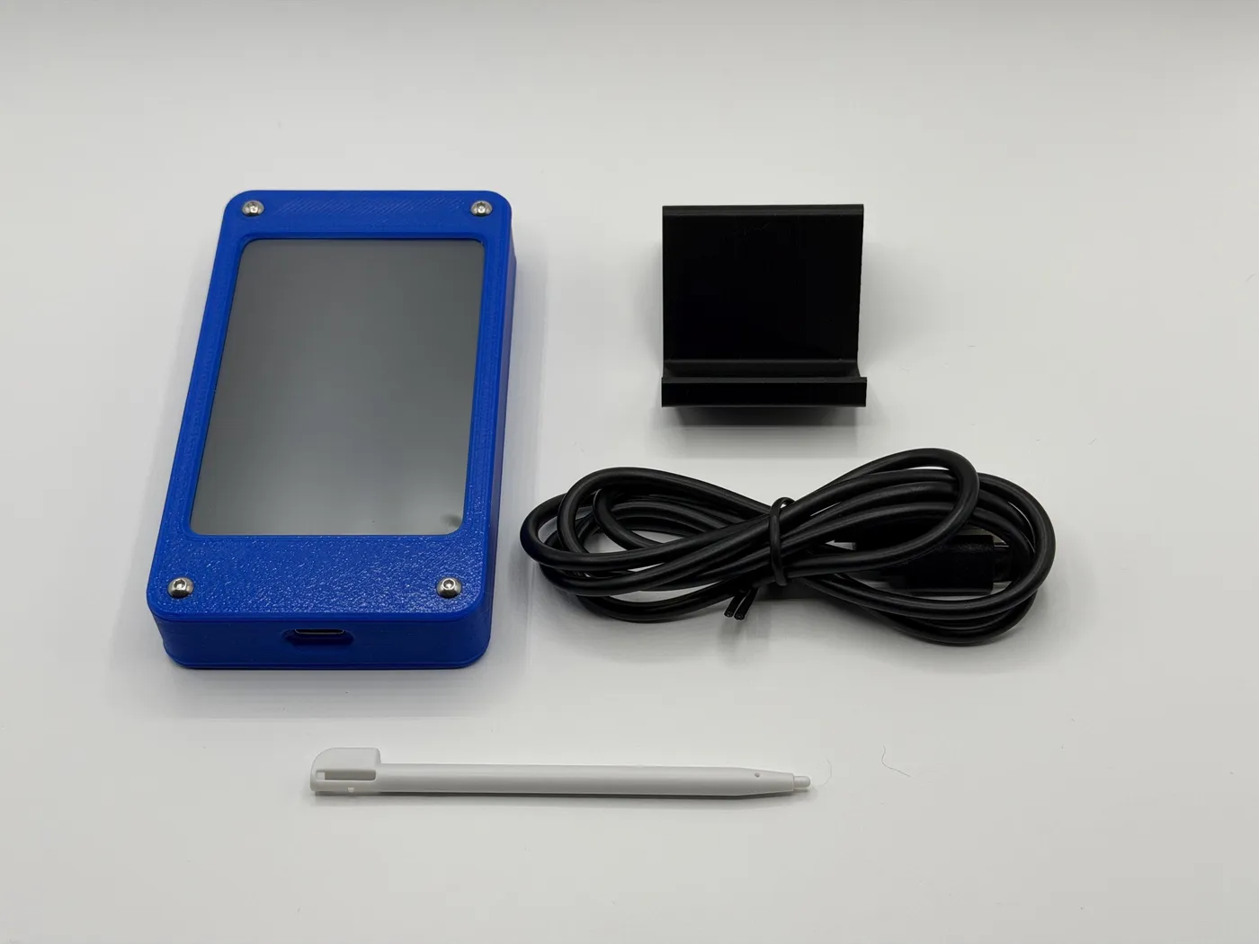 What’s in the box: blue unit, desktop stand, USB-C cable, and stylus