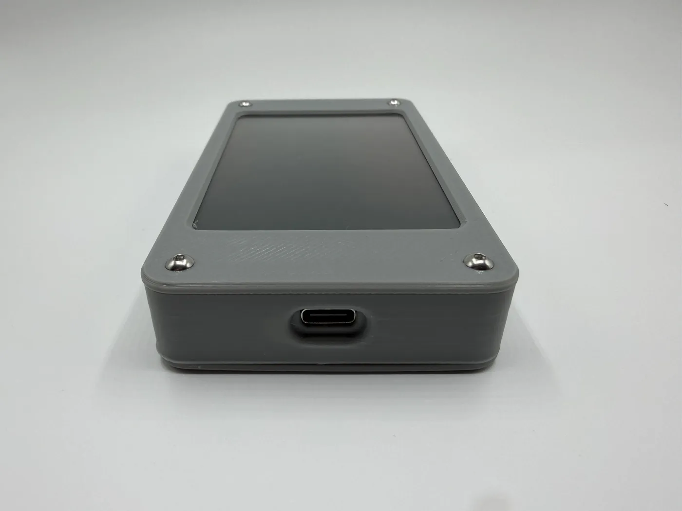 USB-C power port on the bottom edge of the enclosure
